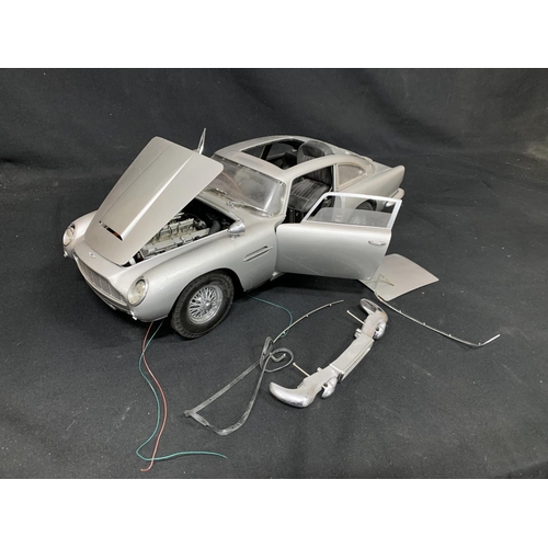 608 - Metal scale model James Bond Aston Martin, length 56cms, height 17cms, sold as seen