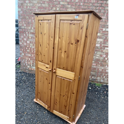 67 - A solid pine double wardrobe 97x 58x158