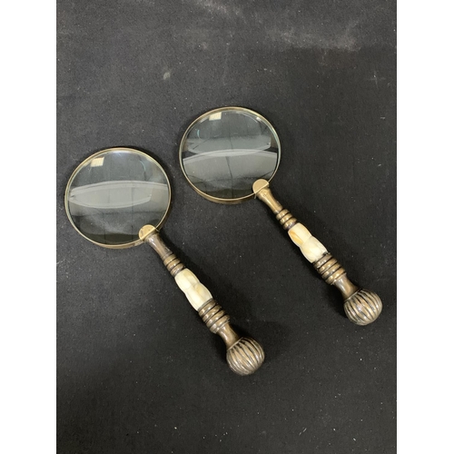 688 - Pair of large Magnifying Glasses length 26 cms