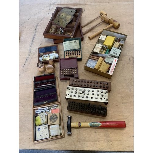 Collection of antique clock and watch parts and tools