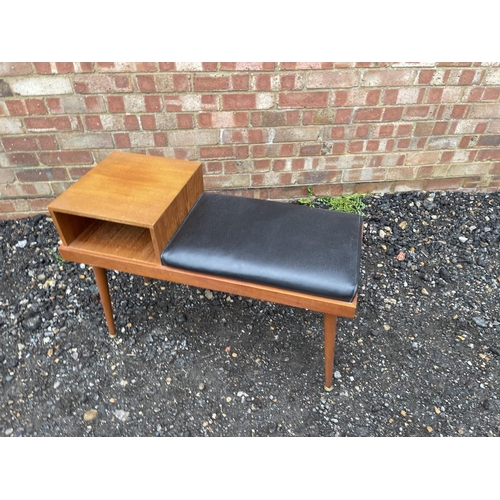 87 - A retro teak hall seat