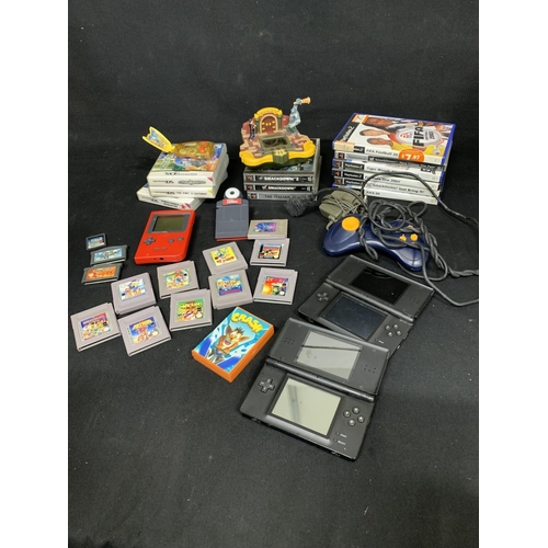 973 - Two Nintendo DS lite,  gameboy, games and PlayStation games (all untested)