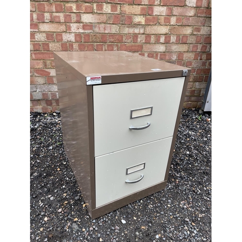 98 - A metal two drawer filing cabinet