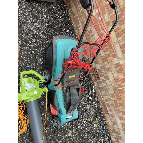 99 - A Bosch electric mower together with an electric blower