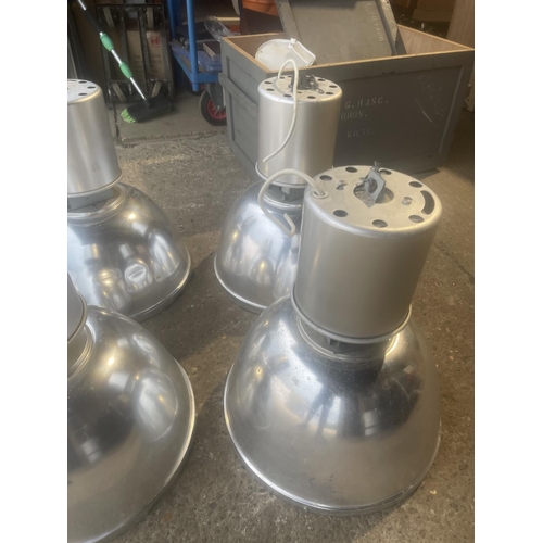 215 - A set of four large industrial pendant light fittings