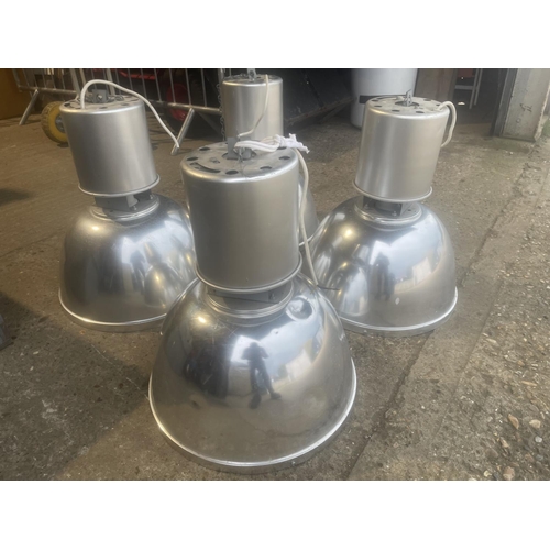 216 - A set of four large industrial pendant light fittings