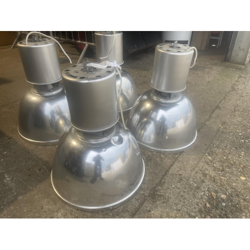 216 - A set of four large industrial pendant light fittings