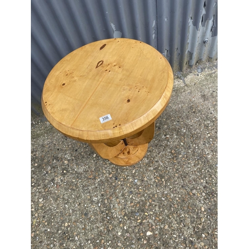 218 - A birds eye maple deco style occasional table 55cm round