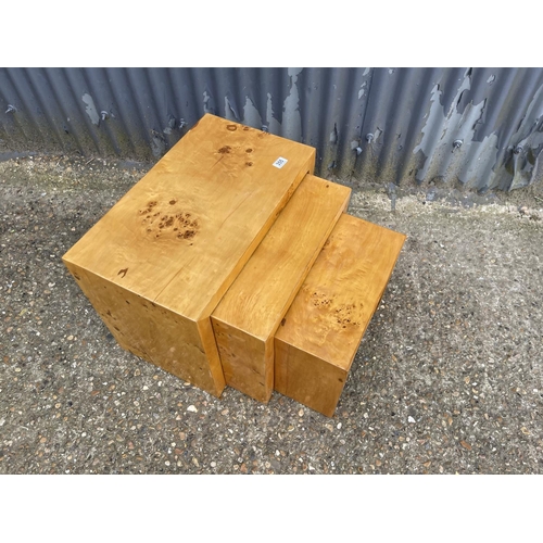 277 - A birds eye maple deco style nest of three tables