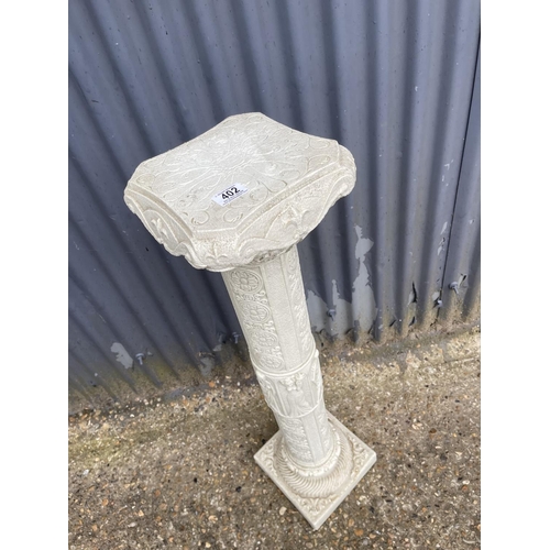 282 - A plastic marble effect plant stand