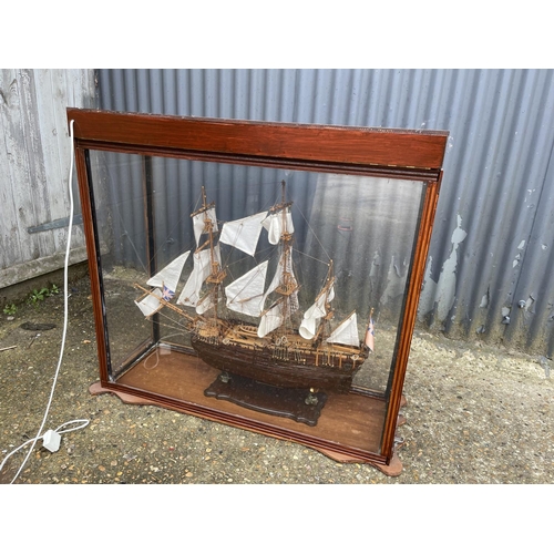 283 - A hand built model of a ship in Perspex illuminating  case 95x33x87