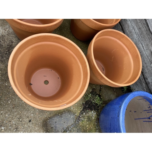 285 - A new pair of large terracotta planters 48 diameter. 40 high