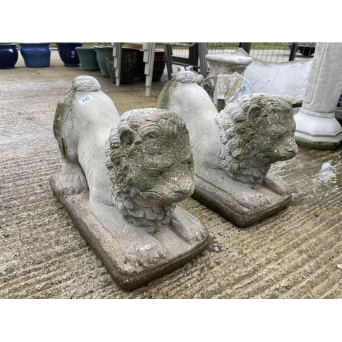 286 - A pair of concrete lion statues