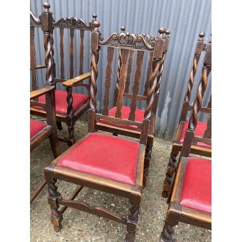 100 - A set of six oak dining dining chairs (inc. 2 carvers)