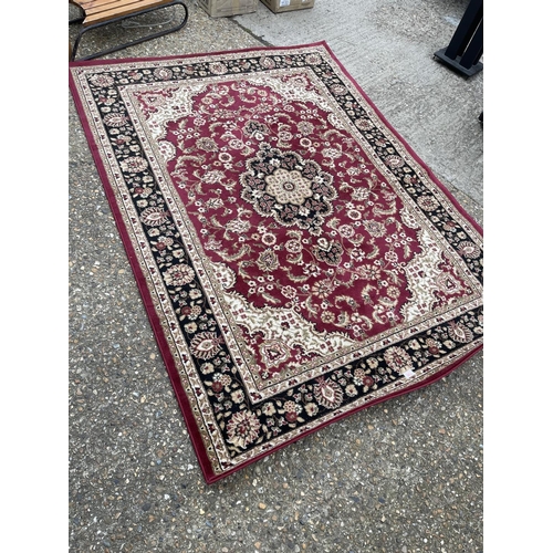 106 - A red pattern rug 160x 289