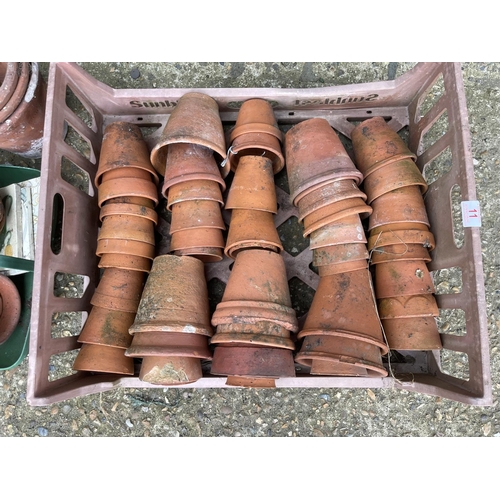 11 - A large tray of assorted terracotta pots and trug of pots and tiles