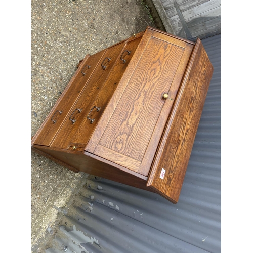 138 - An arts and crafts oak bureau with fitted interior