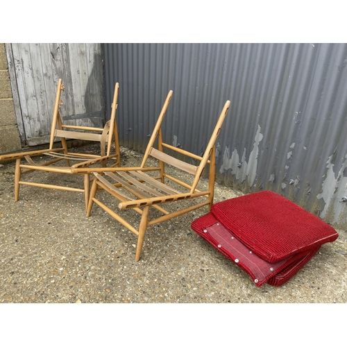 141 - A pair of ercol 427 chairs for re upholstery