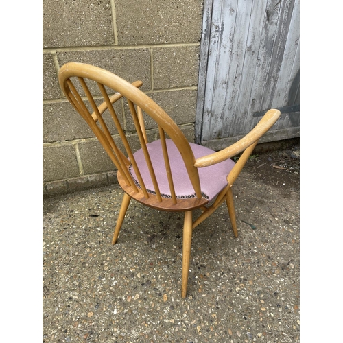 143 - An ercol carver chair