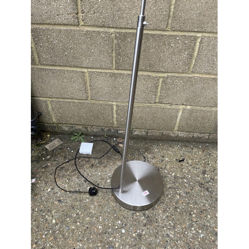 147 - A chrome floor standing lamp