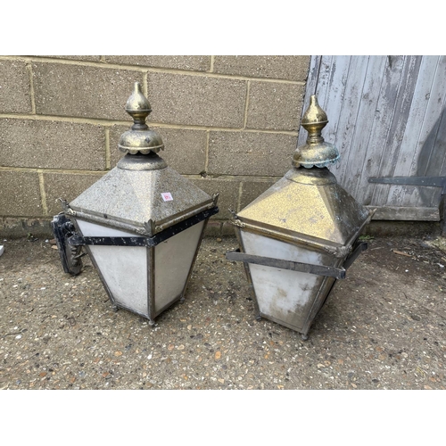 148 - A pair of large brass lantern light fittings with aluminium arm fittings