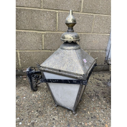 148 - A pair of large brass lantern light fittings with aluminium arm fittings