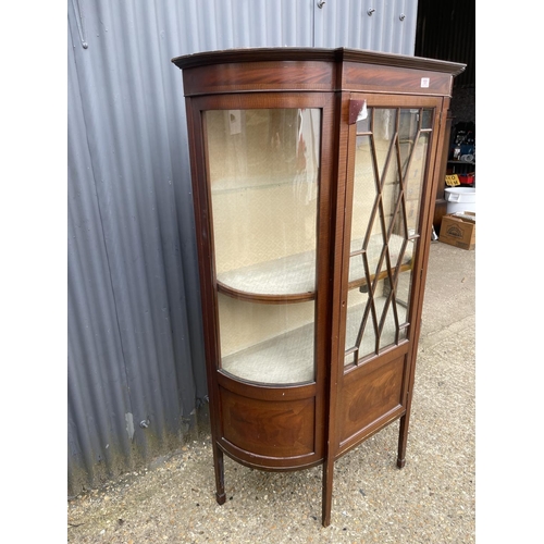 151 - An Edwardian mahogany bow front display cabinet 120cm wide