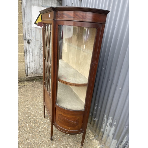 151 - An Edwardian mahogany bow front display cabinet 120cm wide