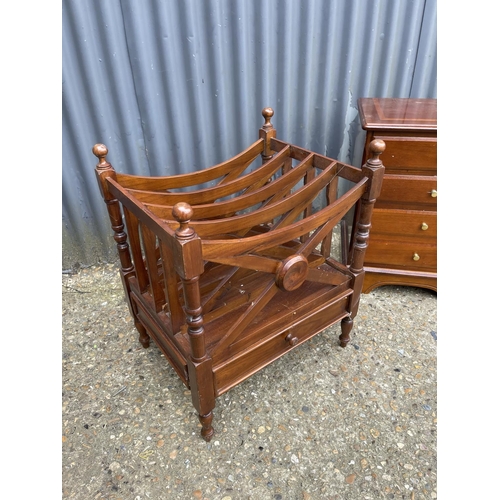 152 - A reproduction Canterbury book rack together with a repro chest of four