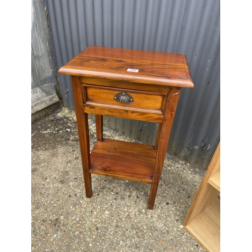 166 - A modern hardwood side table together with a light oak open bookcase