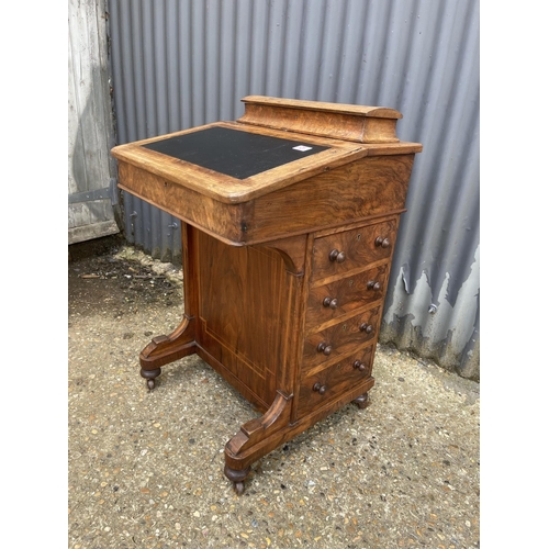 21 - A victorian walnut davenport with four drawers to one side and four dummy drawers, black leather top... 