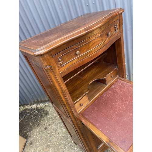 23 - A continental hardwood bureau cabinet 70x40x130