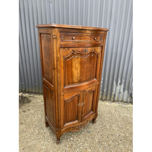 23 - A continental hardwood bureau cabinet 70x40x130