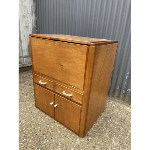 238 - A teak cased ships captains drinks cabinet with tray, bucket, shaker and hip flask. Fitted with plaq... 