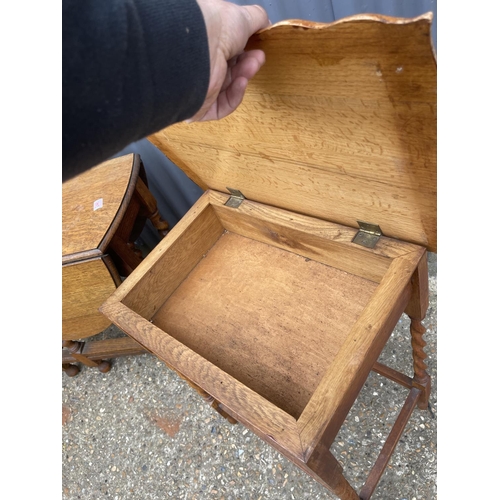 246 - An oak barley twist gateleg table together with a barley twist work box table