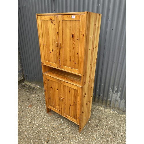 251 - A modern two section pine larder cuoboard 70x37x160