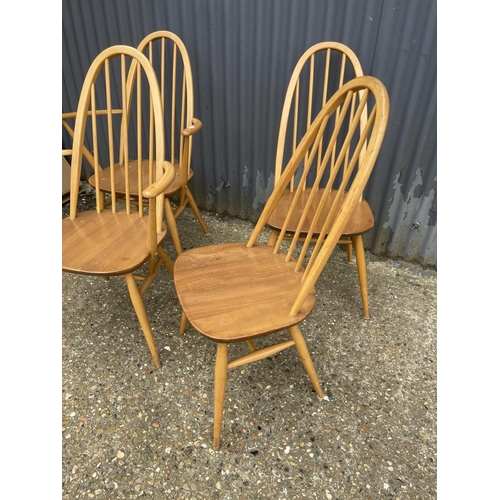 26 - A set of four ercol stick back dining chairs (inc 2 carvers)