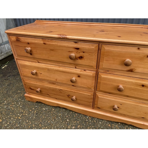 260 - A solid pine bank of six drawers 145x40x 74