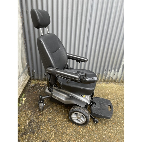 271 - An I-go Zenith pro electric wheelchair, hardly used, in working order with charger