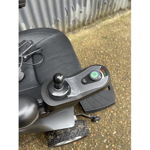 271 - An I-go Zenith pro electric wheelchair, hardly used, in working order with charger