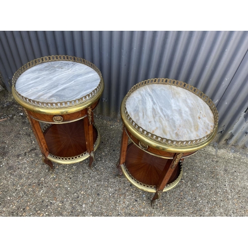 294 - A pair of French gueridon inlaid circular single drawer side tables with brass mounts, brass gallery... 