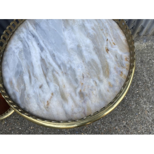 294 - A pair of French gueridon inlaid circular single drawer side tables with brass mounts, brass gallery... 