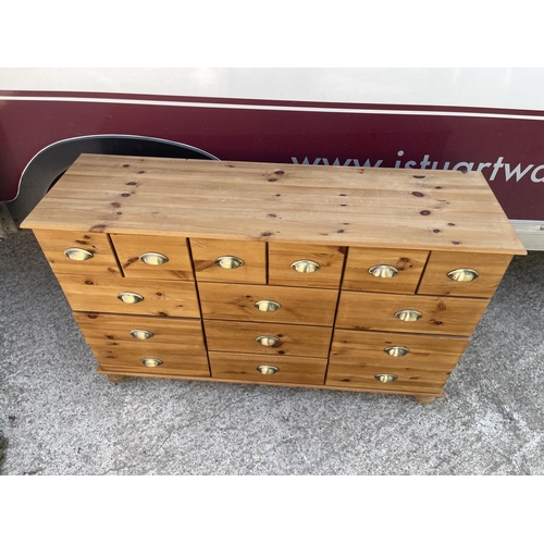 302 - A modern pine bank of 15 drawers 130x 40x 80