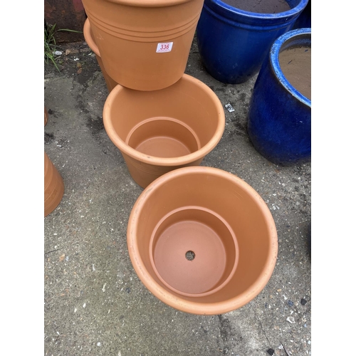 336 - Four new terracotta planters 33round 27 high