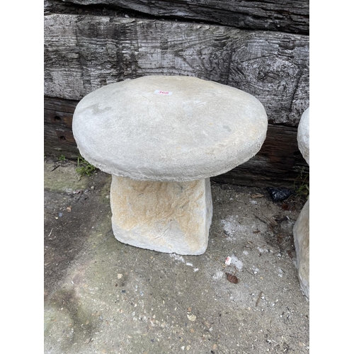 360 - A pair of cast concrete ornamental staddle stones