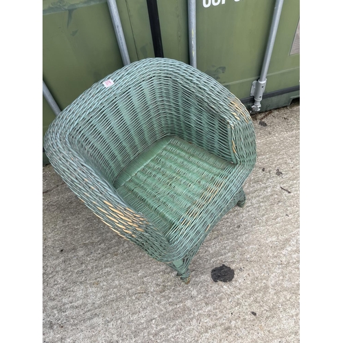 376 - A retro green painted wicker chair