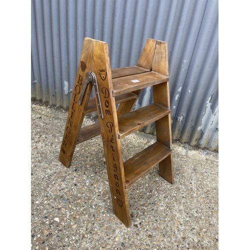 38 - A pair of vintage wooden champagne steps