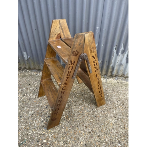 38 - A pair of vintage wooden champagne steps