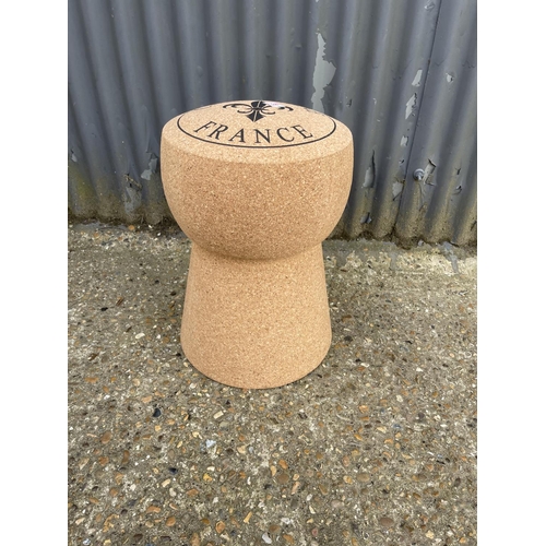 39 - A huge champagne cork seat 50cm tall