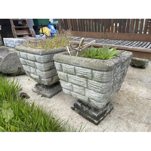 395a - A pair of brick effect concrete pedestal planters